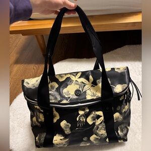 lululemon athletica Black and Gold Floral Duffel Bag